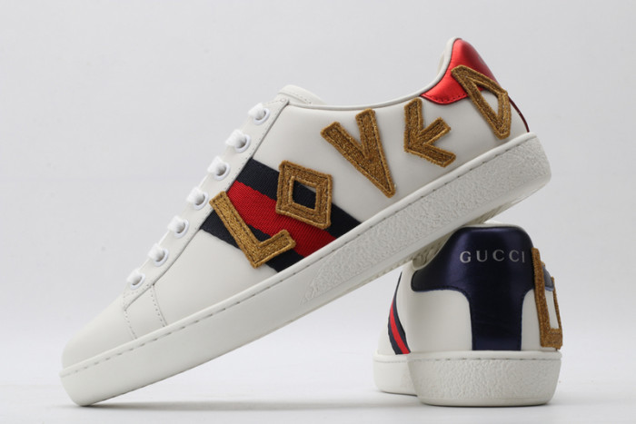 gu ace embroidered low-top sneaker